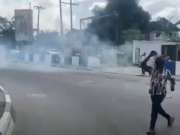 VIDEO: Police Fire Tear Gas at Protesters in Port Harcourt Police Fire Tear Gas at Protesters in Port Harcourt