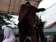 Couple Receive 100 Strokes of Lashing in Public After They were Discovered to Have Engaged in Sexual Activities Before Marriage Couple Receive 100 Strokes of Lashing in Public After They were Discovered to Have Engaged in Sexual Activities Before Marriage